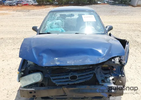 2002 Toyota Corolla Ce z USA, uszkodzony, nr VIN 1NXBR12E42Z627627